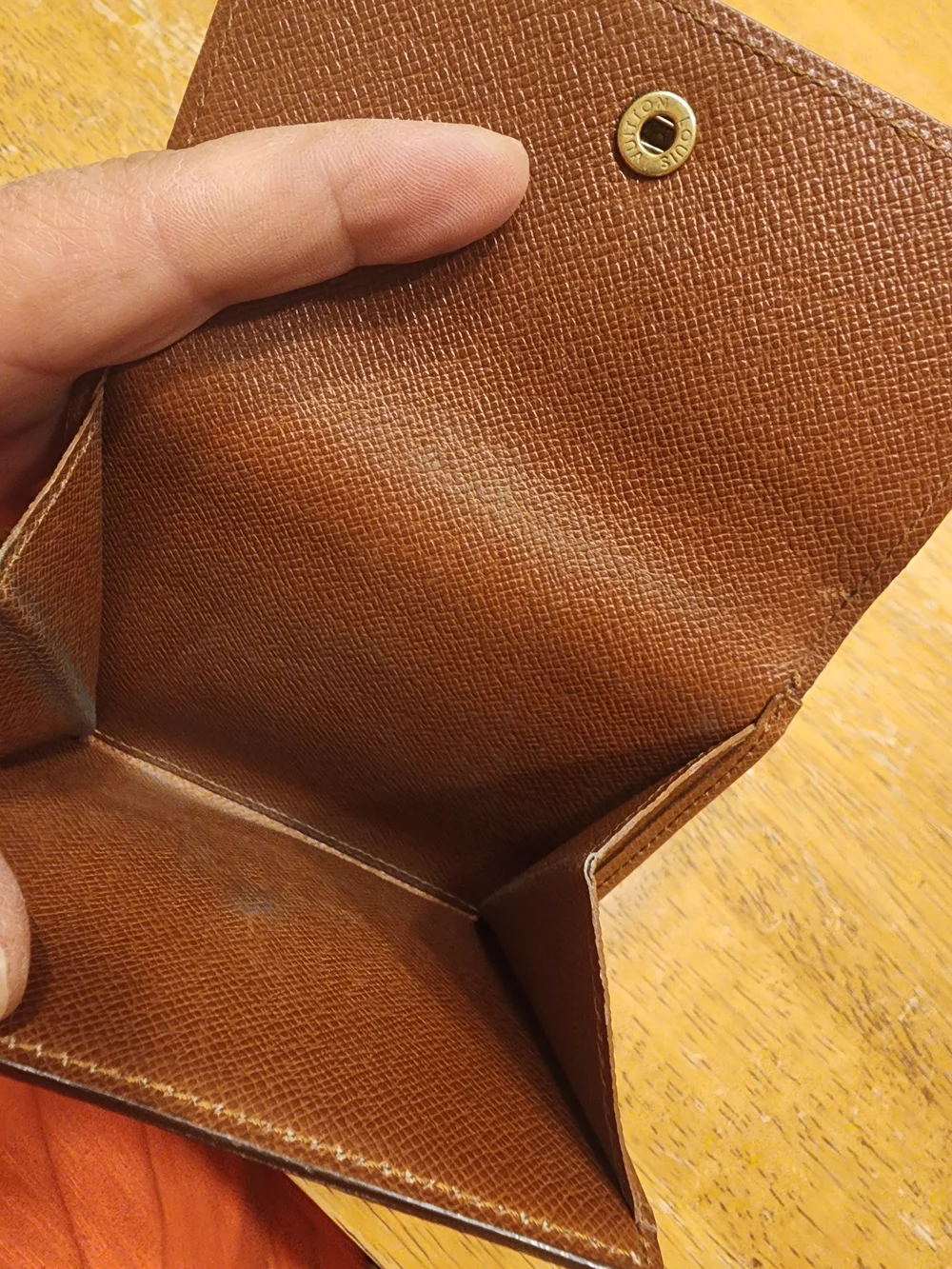 vintage Louis Vuitton Monogram Elise Wallet crafted in the classic brown LV